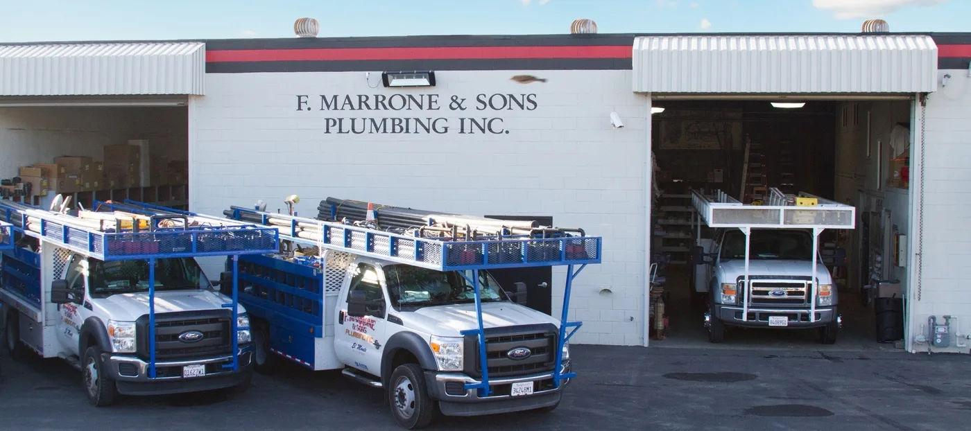 The Frank Marrone and Sons Plumbing Inc. shop in El Monte with the company fleet